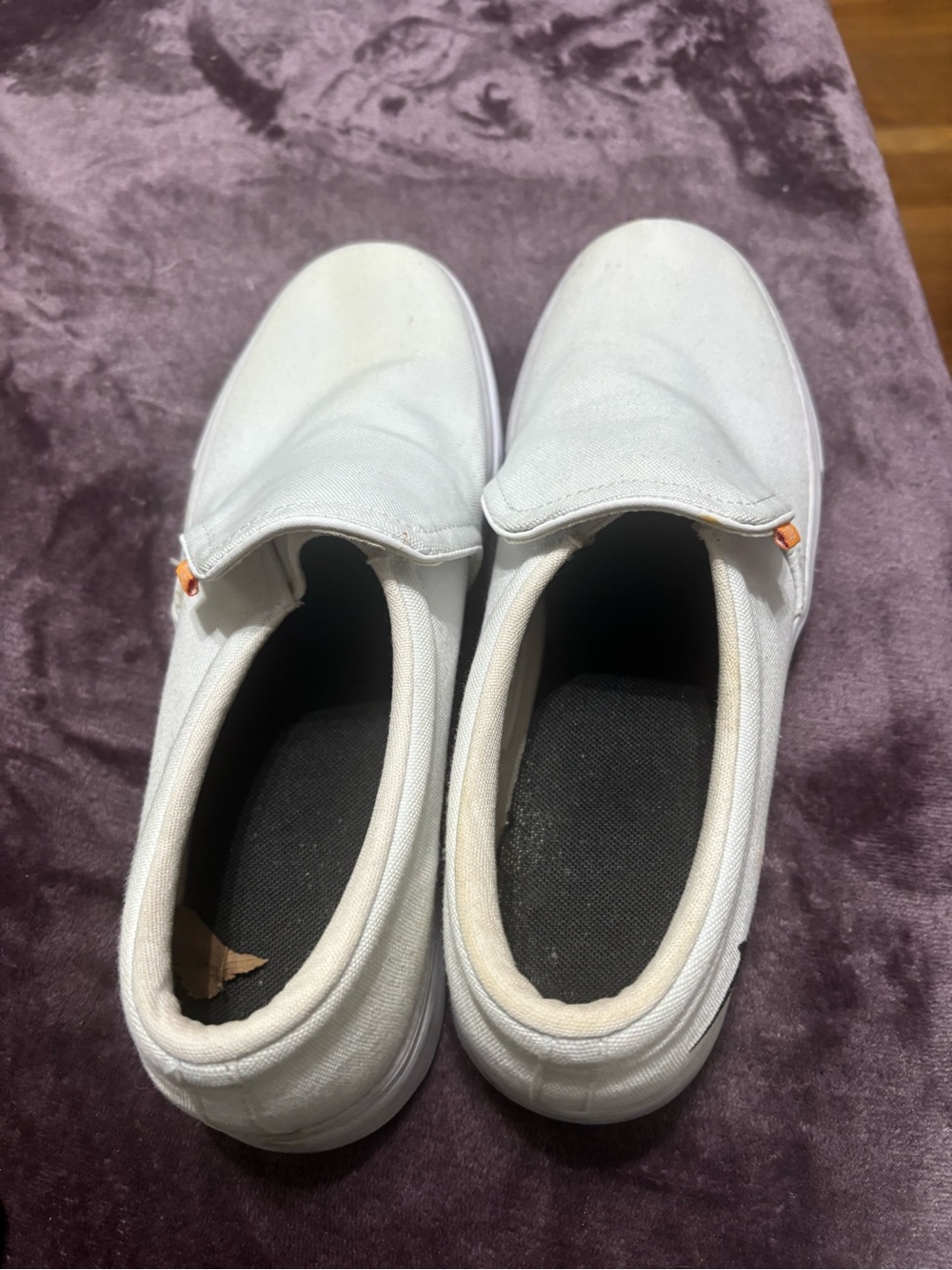 Nike White Canvas Slip-On Sneakers with Orange Tab Accent